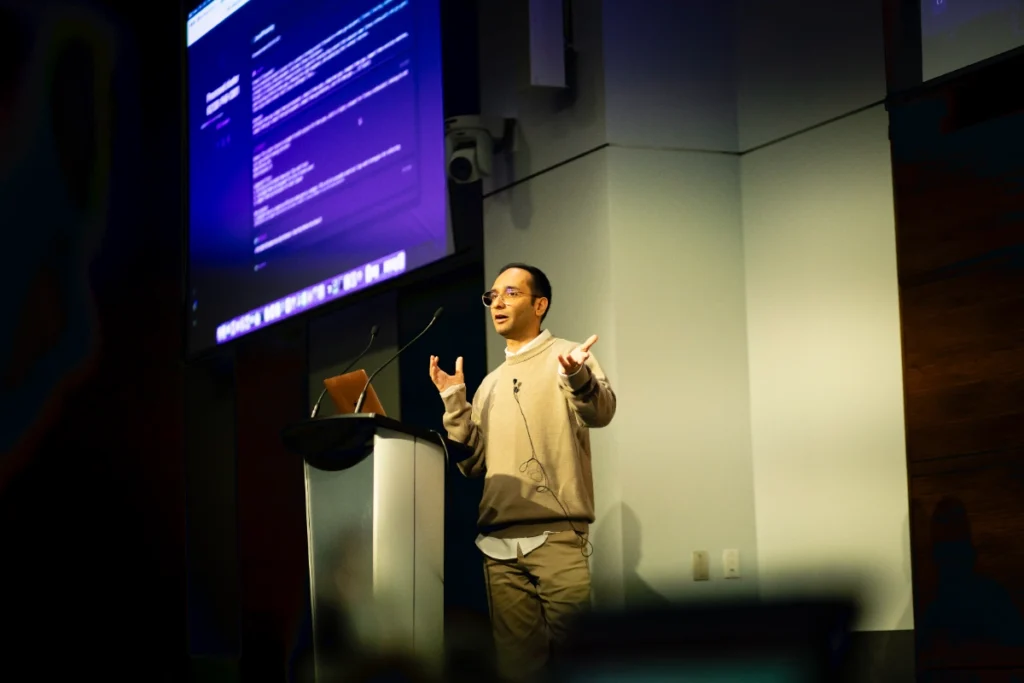 Amin Foroutan speaking during his presentation at SEO IRL 2025.